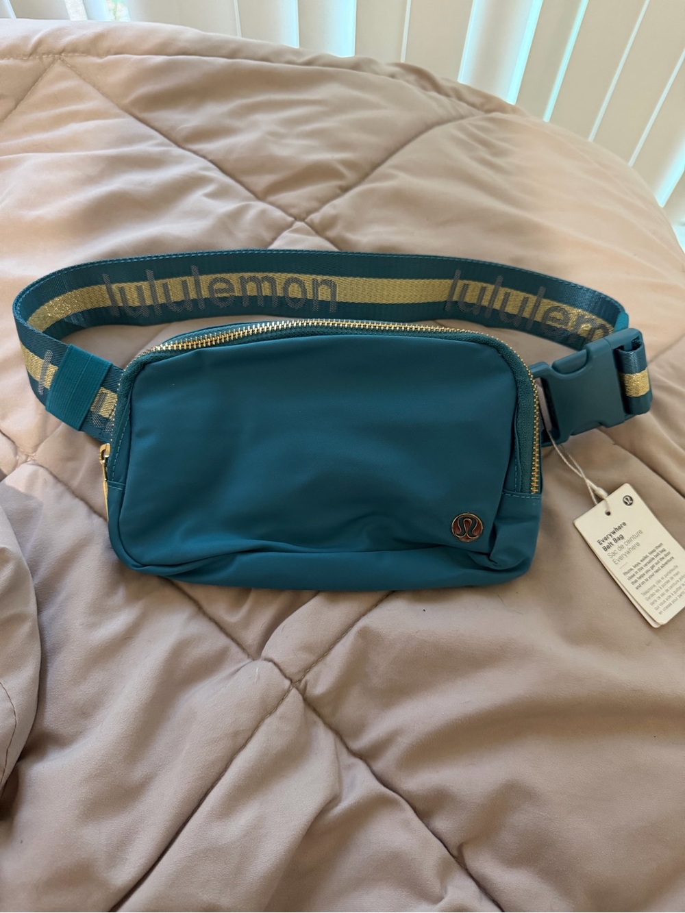 Lululemon turquoise and gold belt bag